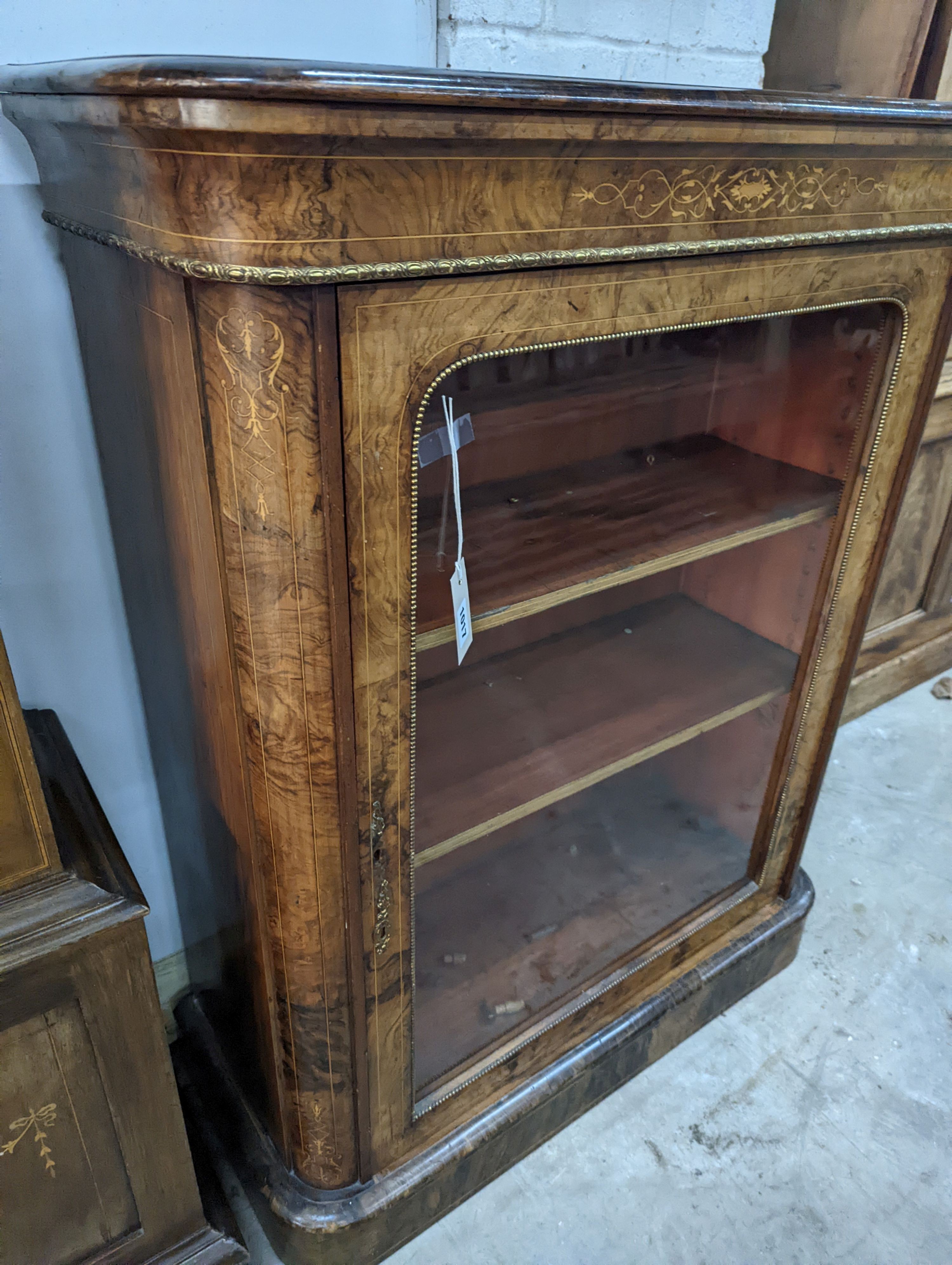 A Victorian inlaid gilt metal mounted figured walnut pier cabinet, width 84cm, depth 35cm, height 105cm